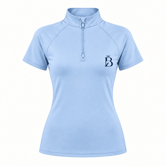 Bajolek riding top in light blue, front view with subtle navy left-chest logo