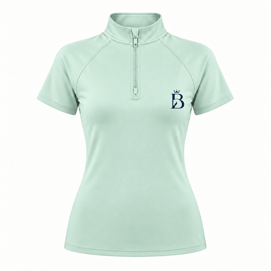 Bajolek riding top in mint, front view with subtle navy left-chest logo
