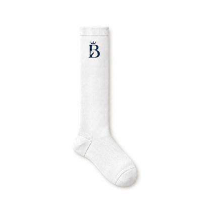 Bajolek white knee-high riding sock with a navy crowned-B emblem